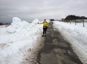 Snowplow-cleared lane 450m up on the hills